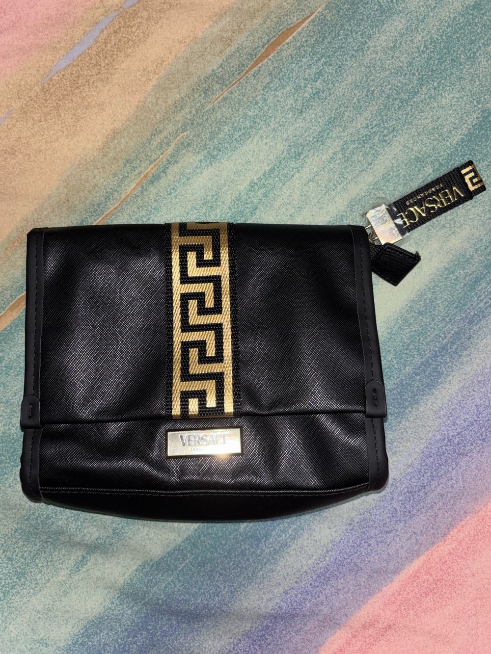 Versace fragrance pouch new with protective plastic on zipper pull never used